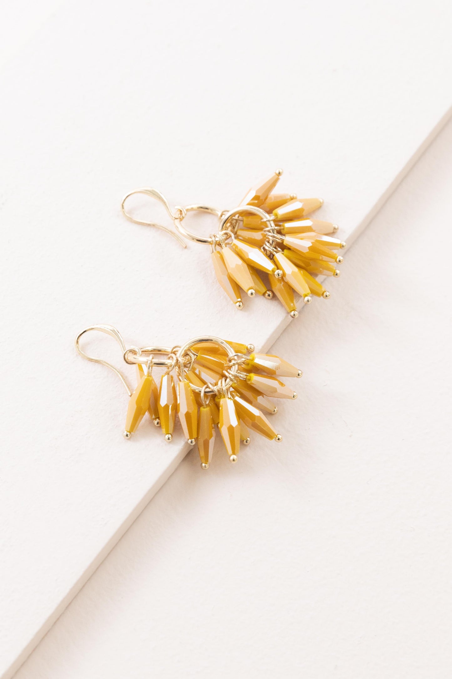 Fetching Frills Hook Earrings | Mustard