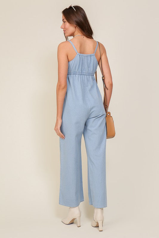 DENIM BLUE SLEEVELESS JUMPSUIT WITH SELF FRONT TIE