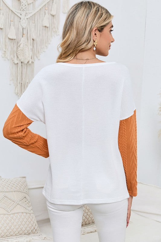 Cable knit color block round neck sweater