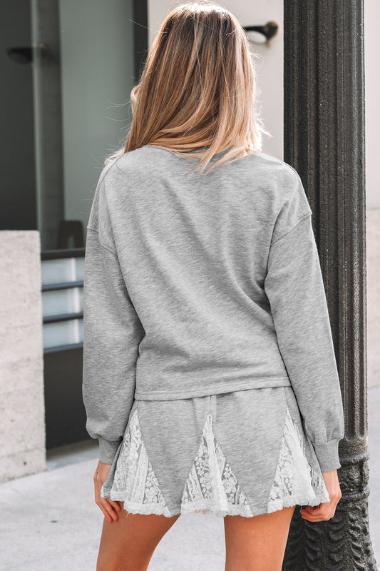 Lace Patchwork Pullover and Drawstring Skort Set