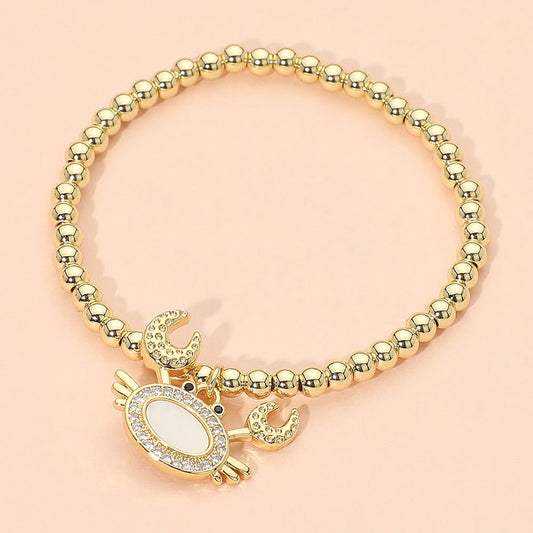 Women's Stainless Steel Mother of Pearl CZ Stone Paved Crab Charm Beaded Stretch Bracelet