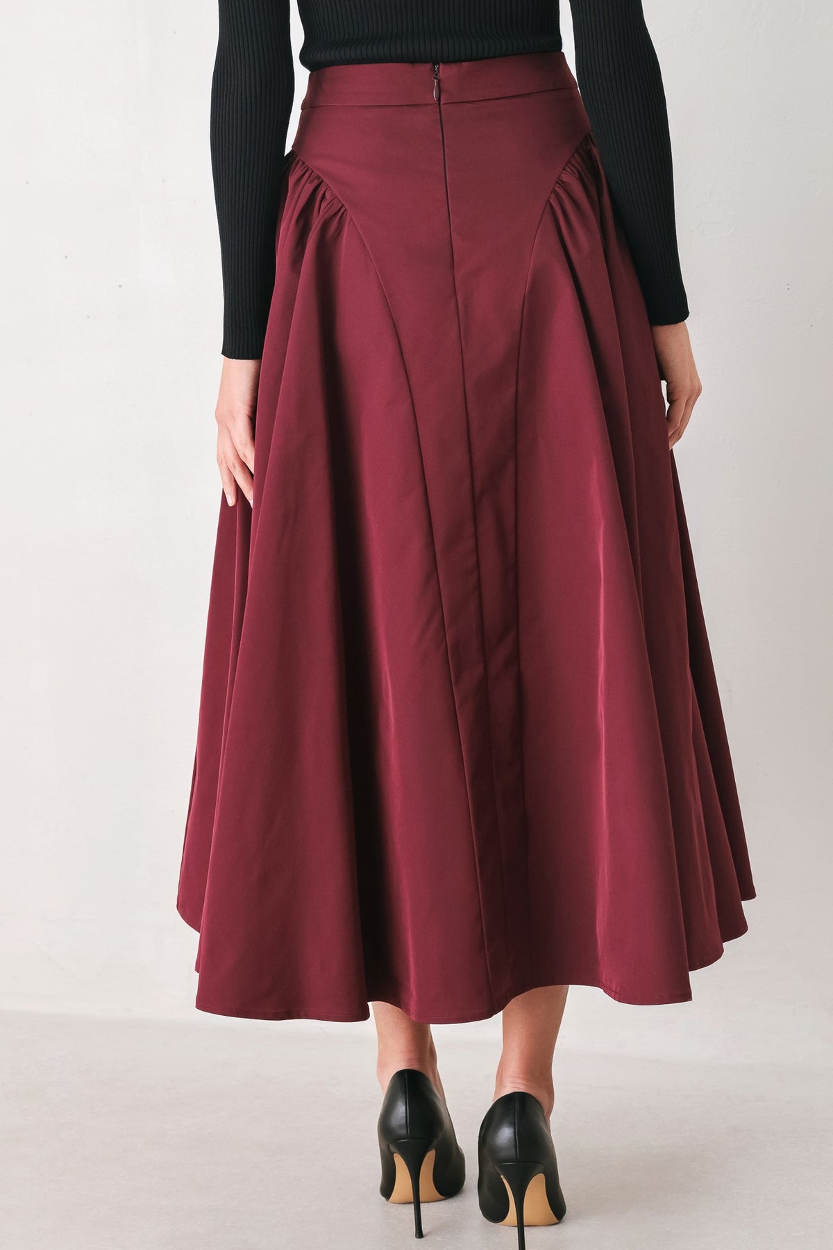 SCULPTED NOIR SHIRRED MIDI SKIRT