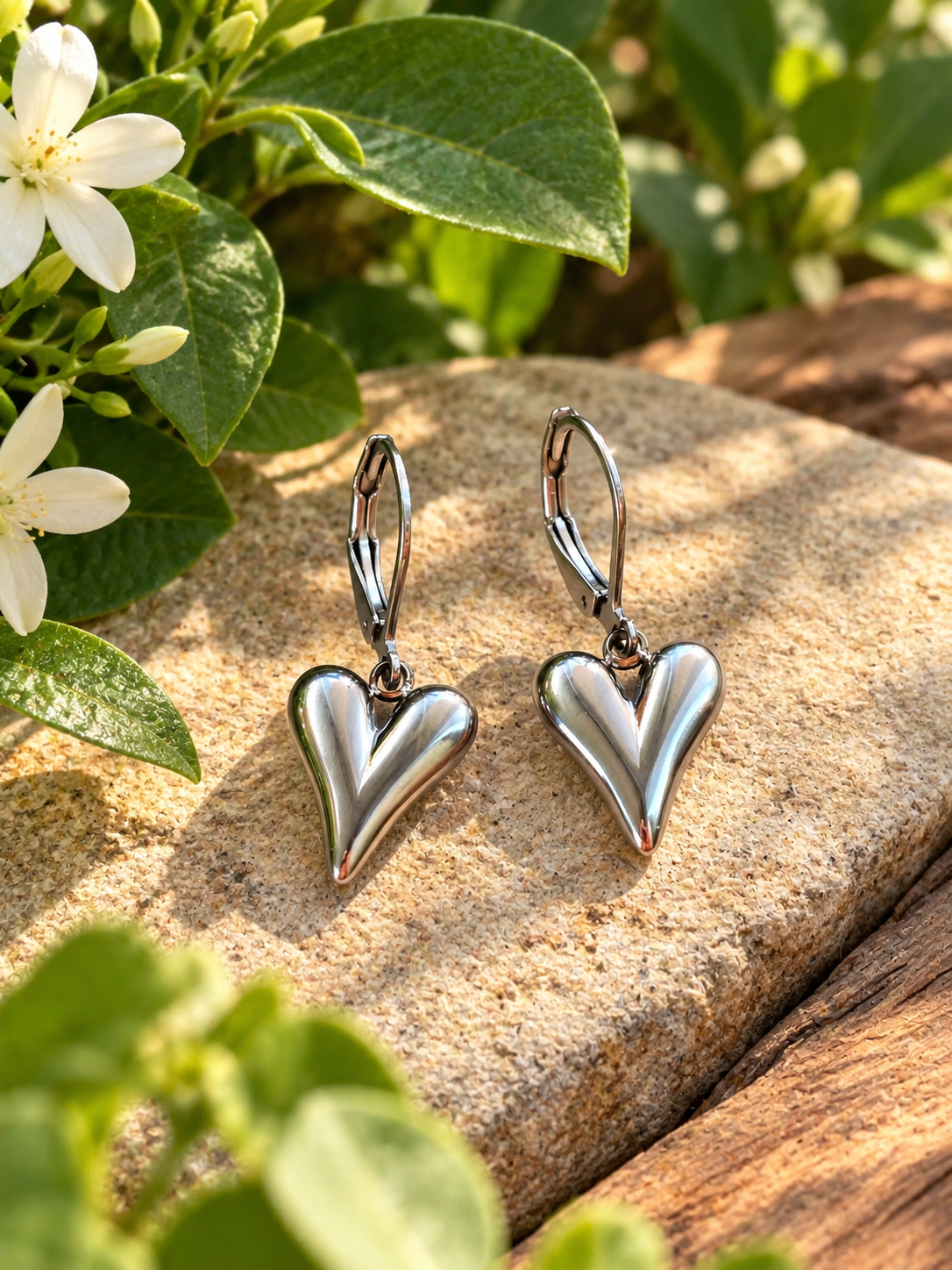 SILVER SCULPTED HEART EARRINGS