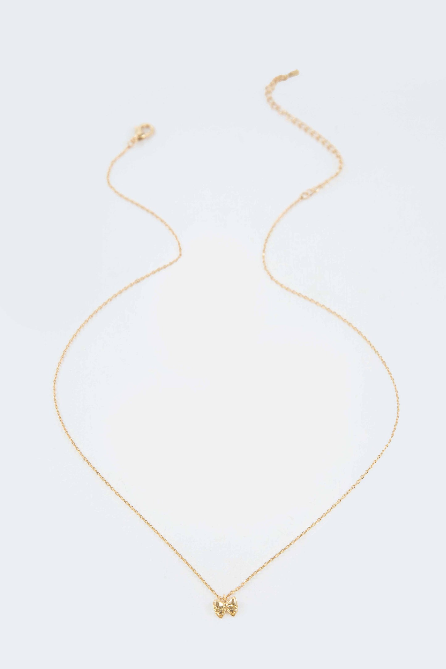 Teeny Bow Charm Necklace | Gold