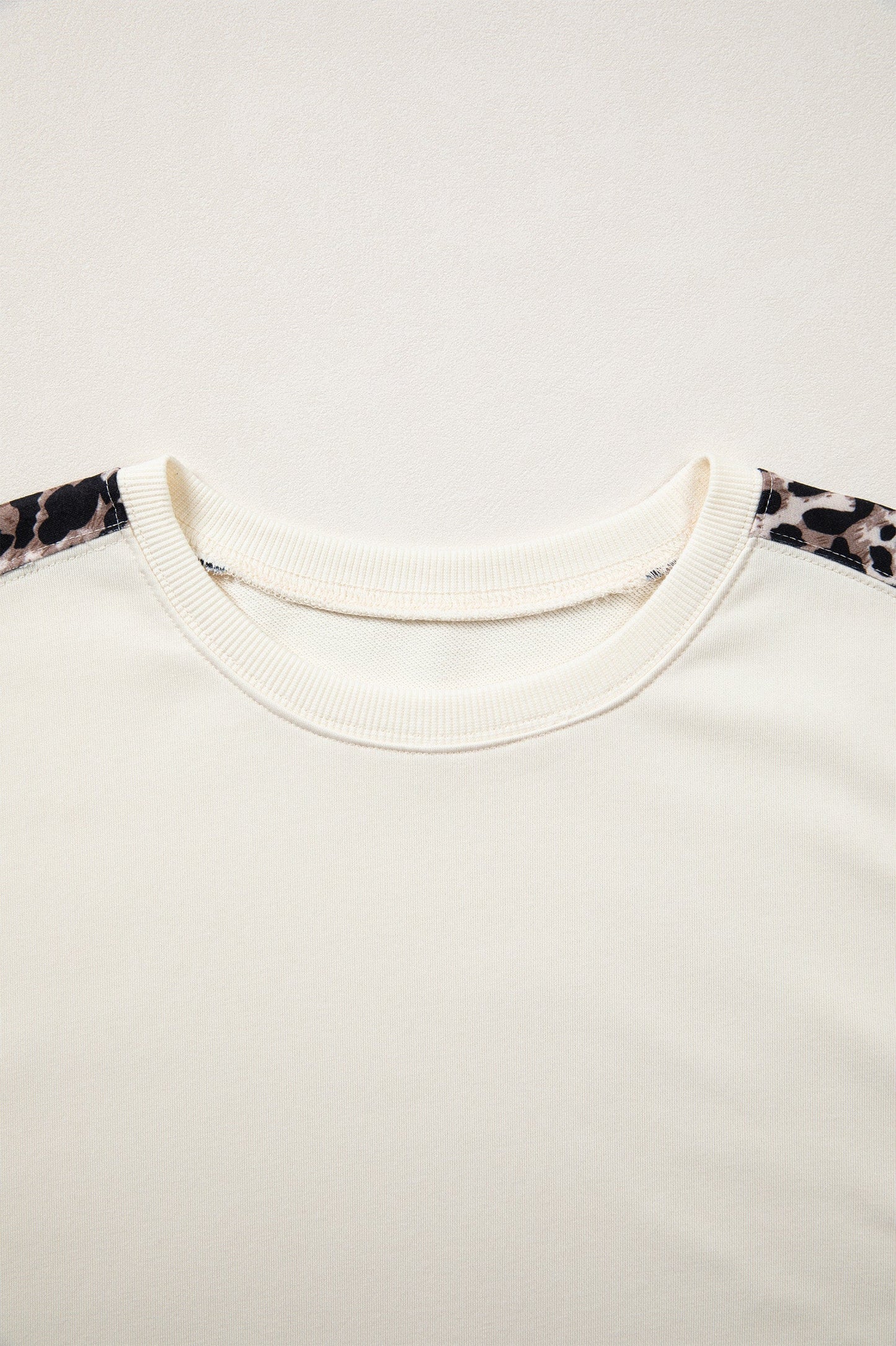 Leopard Patchwork Uneven Hem Short Sleeve Top