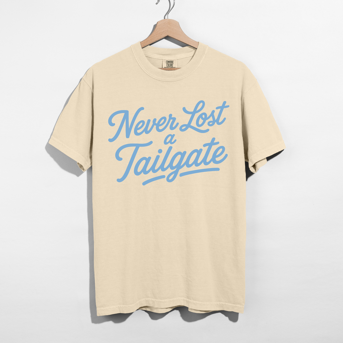 Never Lost a Tailgate Baby Blue Graphic Tee – Carolina Blue Football Game Day Shirt